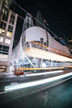 Captivating long exposure photo of San Francisco's urban architecture with bright trails of city lights.