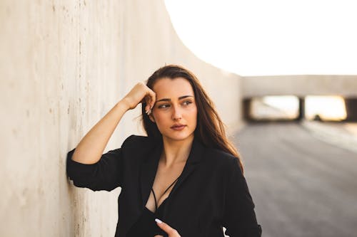 Free Photo Of Woman Leaning On Wall  Stock Photo