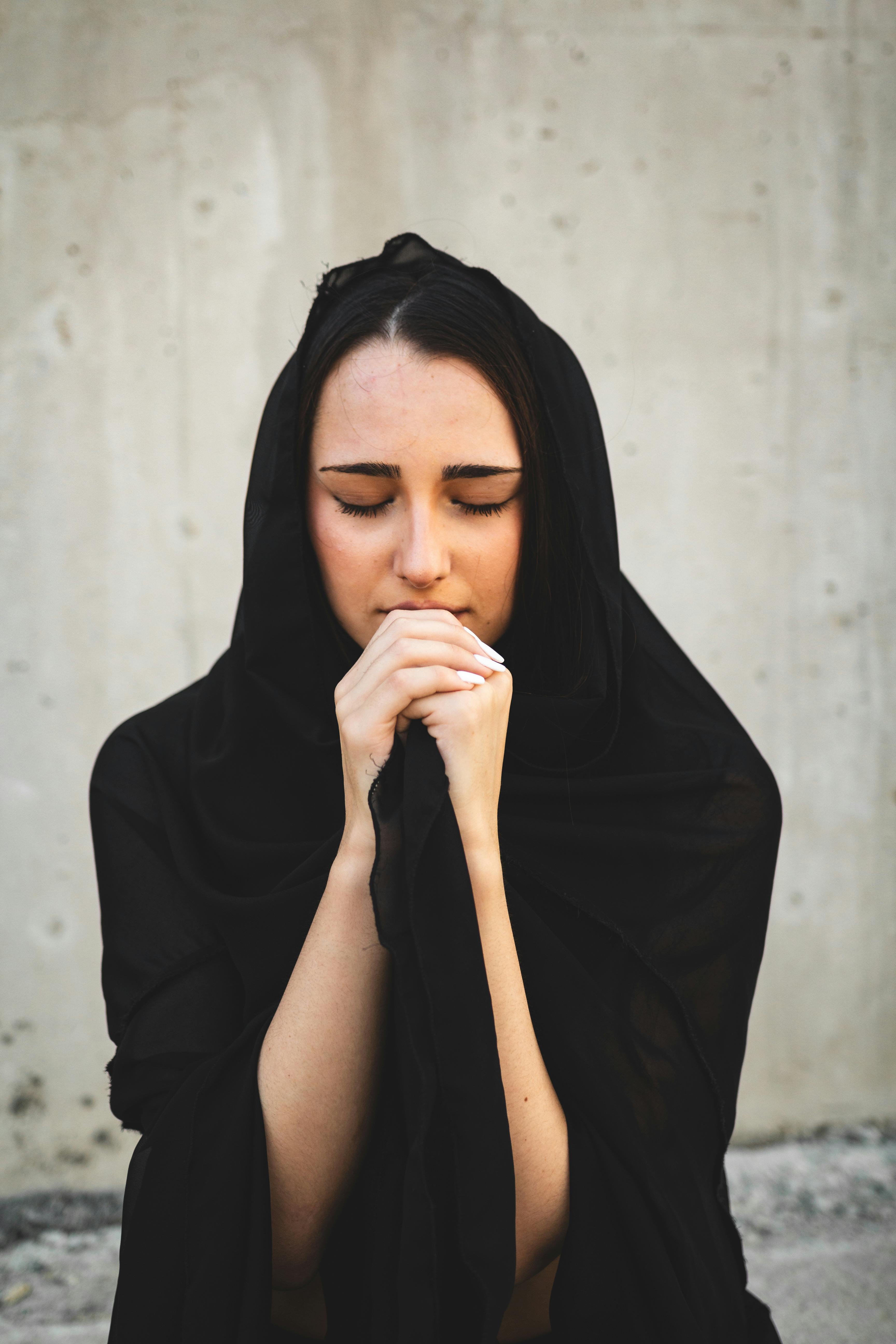 Woman Wearing Head Scarf Praying · Free Stock Photo