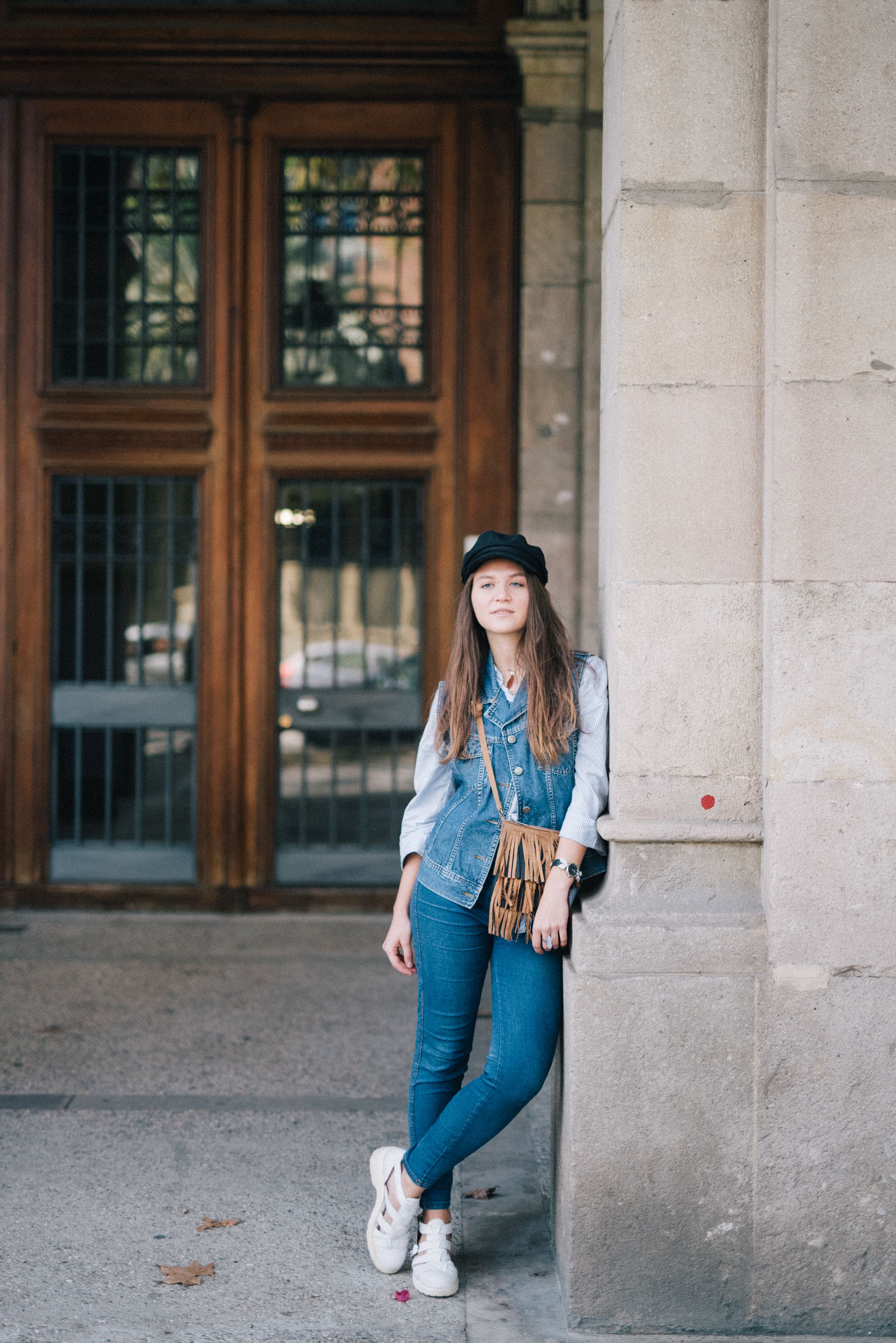 A Woman in Blue Jacket and Denim Jeans · Free Stock Photo
