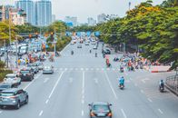 People Riding on Bicycle on Road