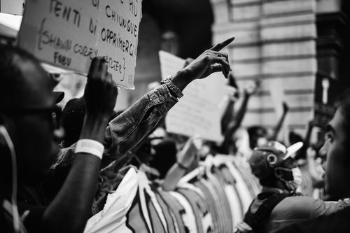 Free Black and white image of a passionate protest in Torino, capturing unity and expression. Stock Photo