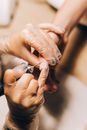 Person Holding Silver Diamond Ring