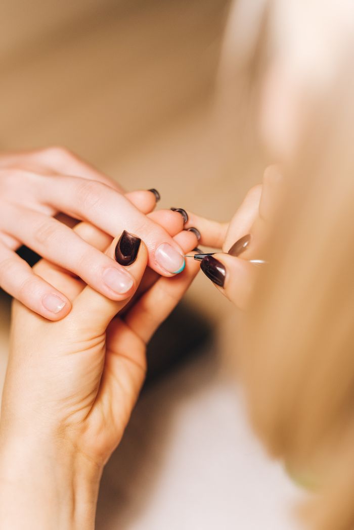 Close-up of nail work during nail training