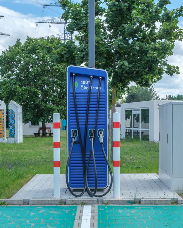 Public charging station with eco-friendly design for electric vehicles.