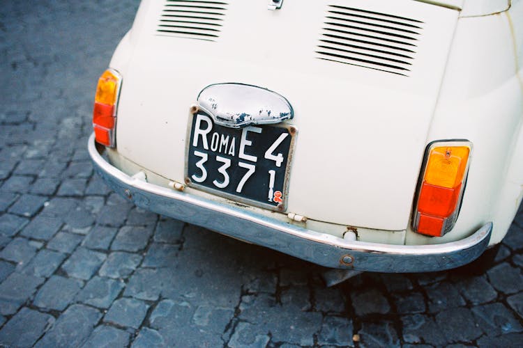 A Close-Up Shot Of A Fiat 500 Car