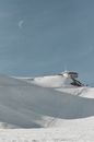 White and Gray Ship on Snow Covered Ground Under Blue Sky