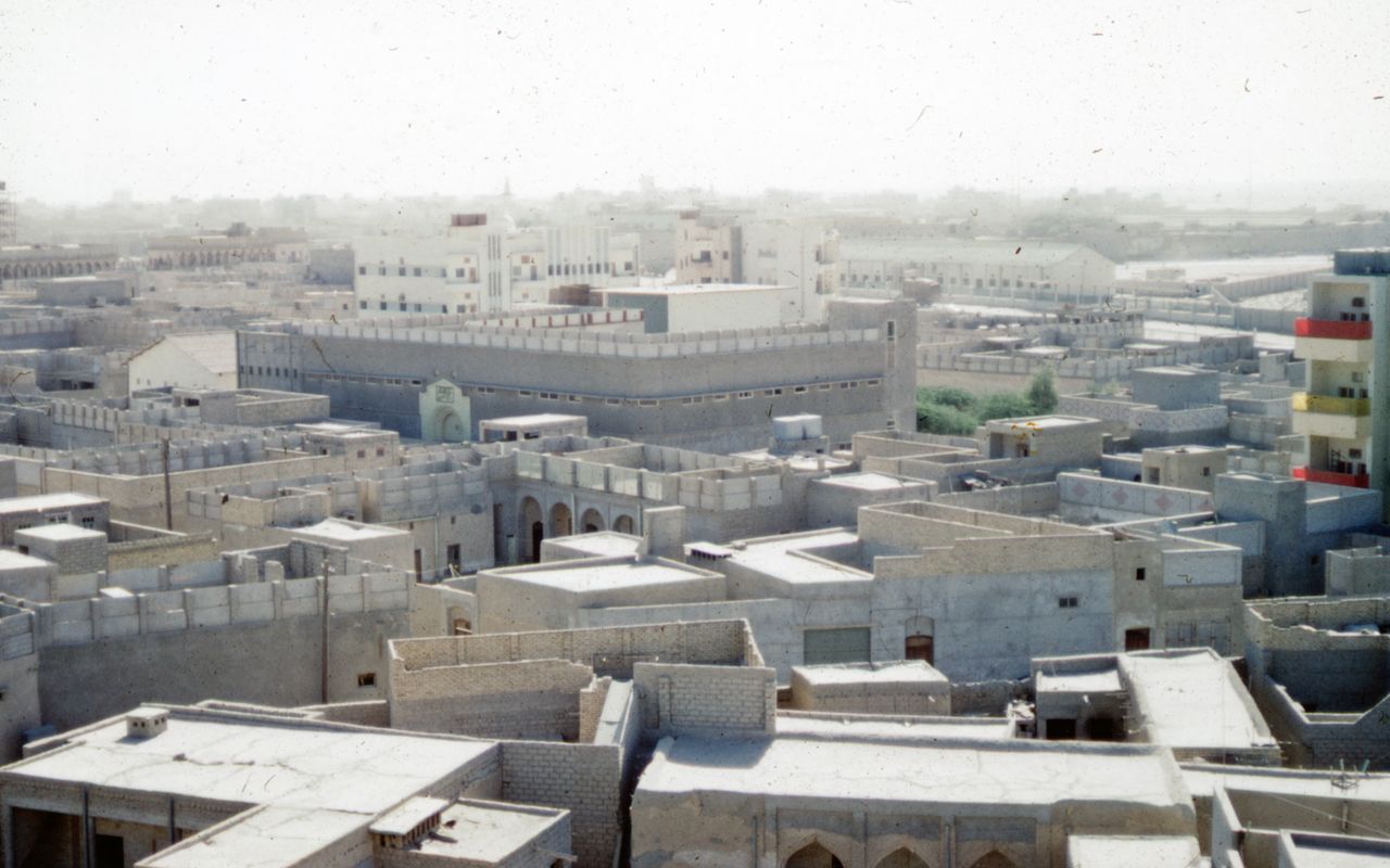 an expansive aerial view of traditional middle eastern buildings under