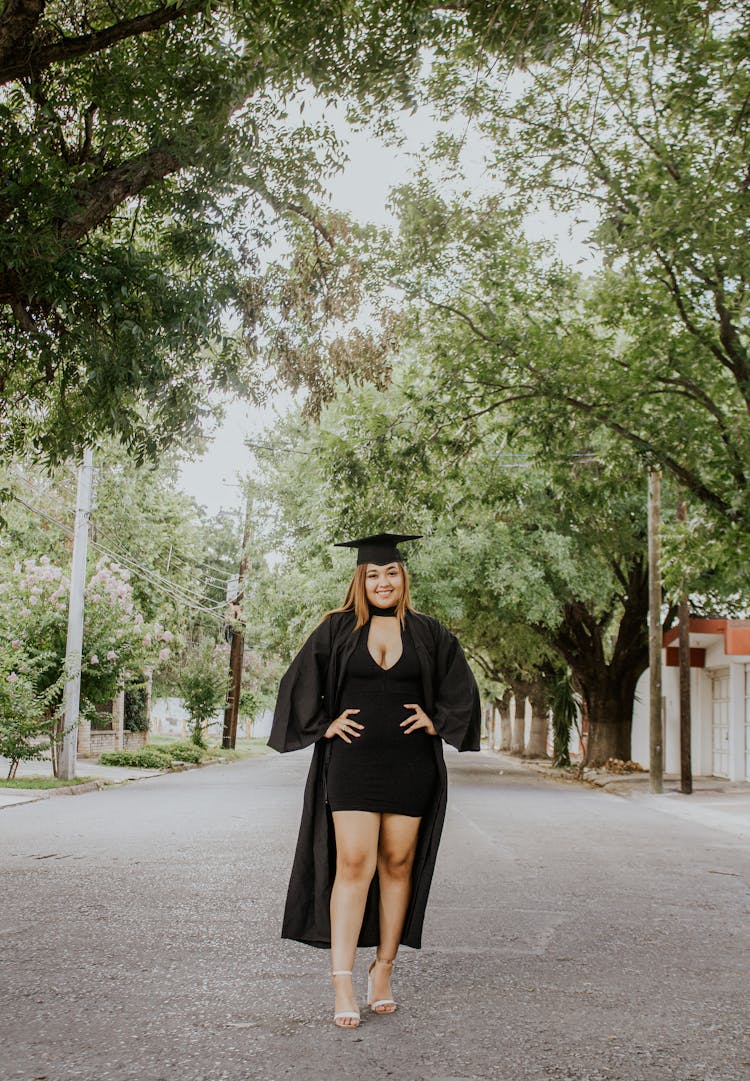 Elegant Woman In Black Cape