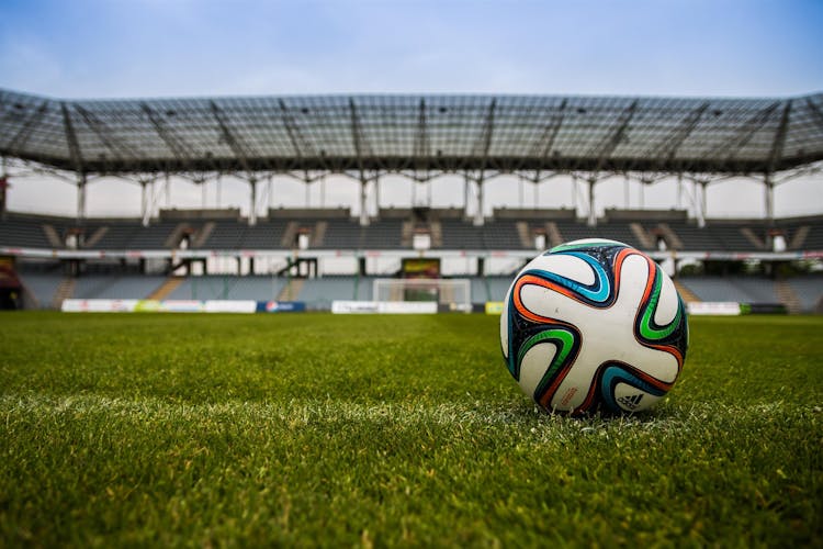 Soccer Ball On Grass Field During Daytime