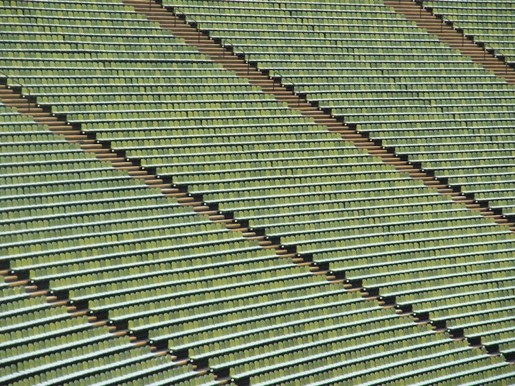 Green Seats Of The Olympic Stadium In Munich