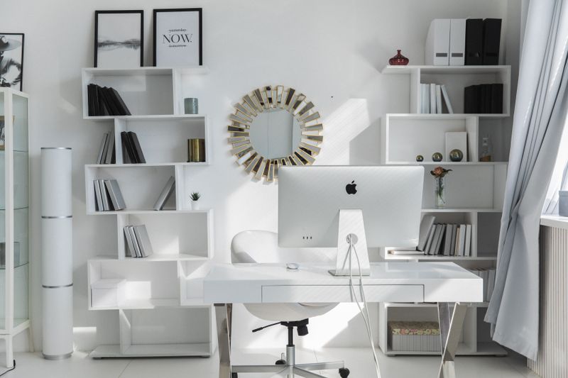 single floating wall shelf serving as a minimalist desk