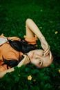 Woman Lying Down among Flowers