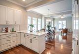 White wooden kitchen cabinets