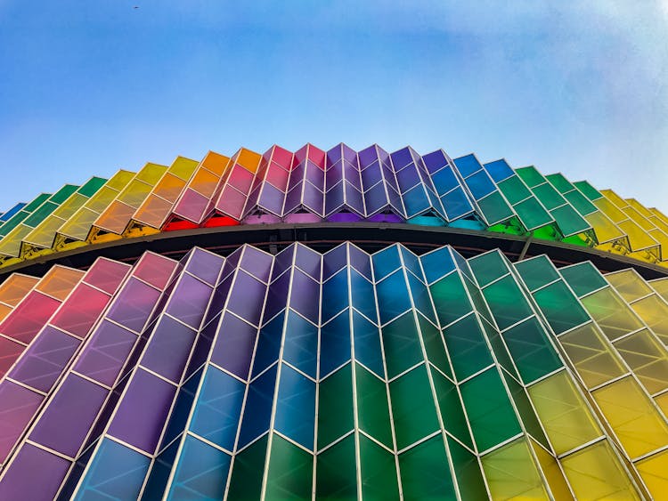 Blue And Yellow Glass Walled Building