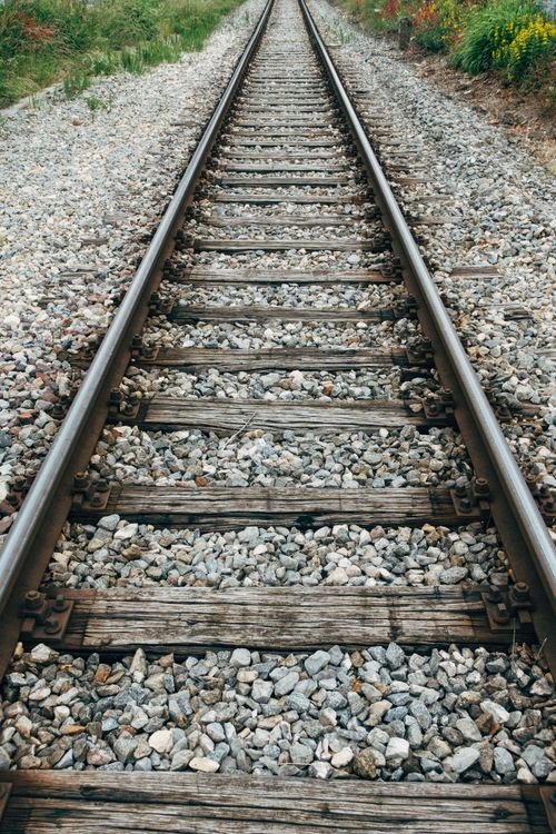 A Railroad With Rocks · Free Stock Photo
