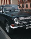 Black GAZ-24 Volga Classic Car Parked on Road