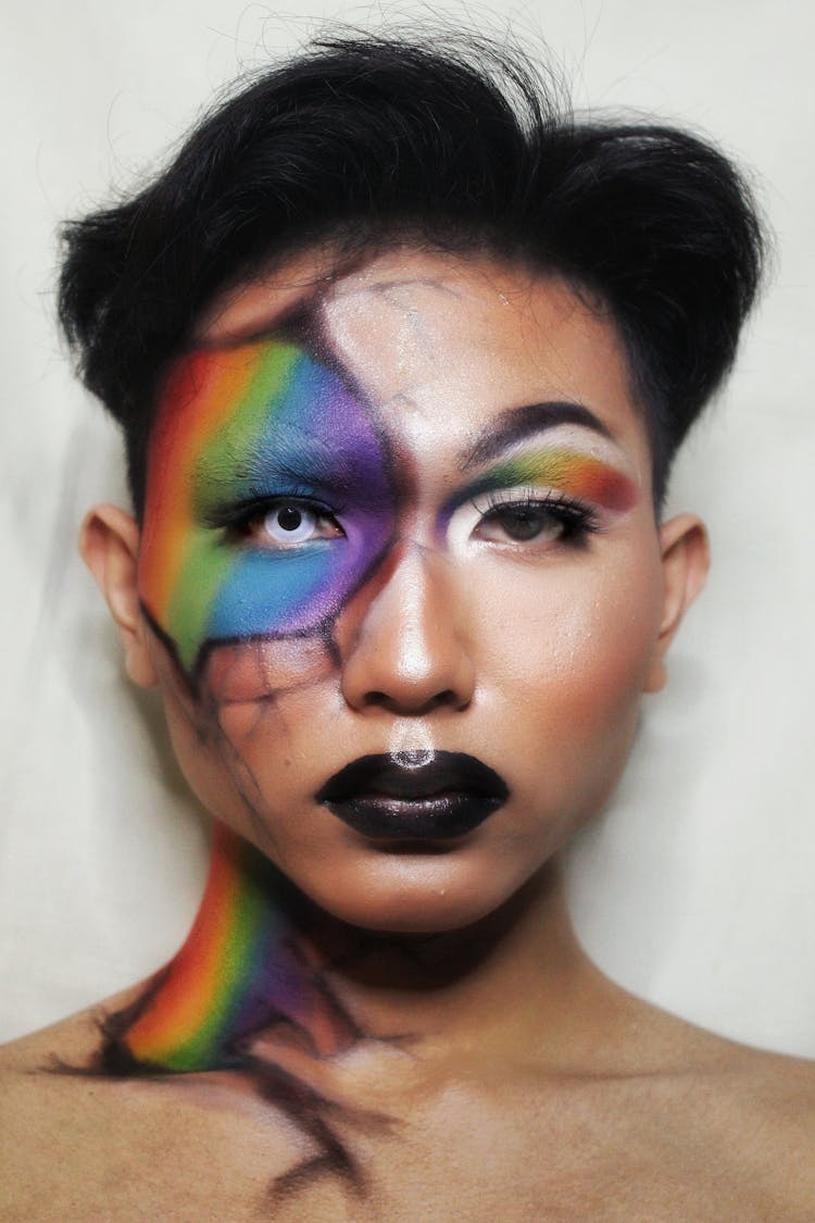 Young Man With Bright Painted Face