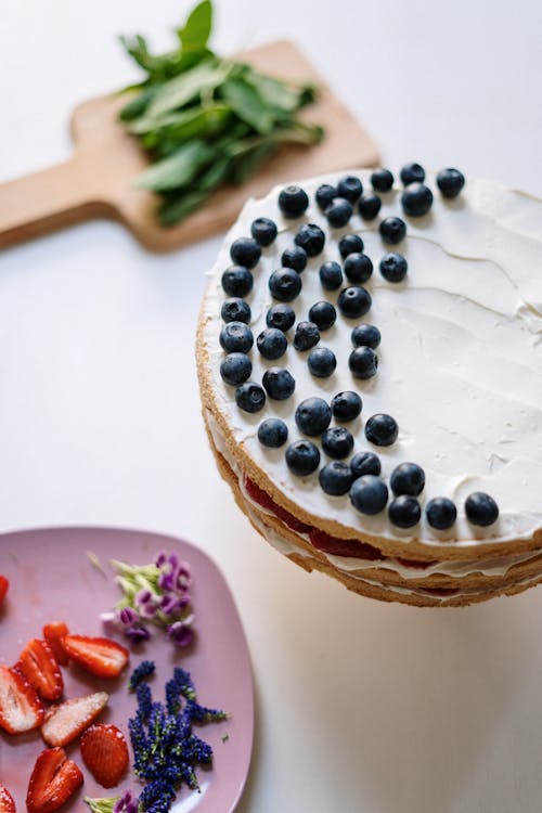 Blueberry and Blackberry on White Ceramic Plate