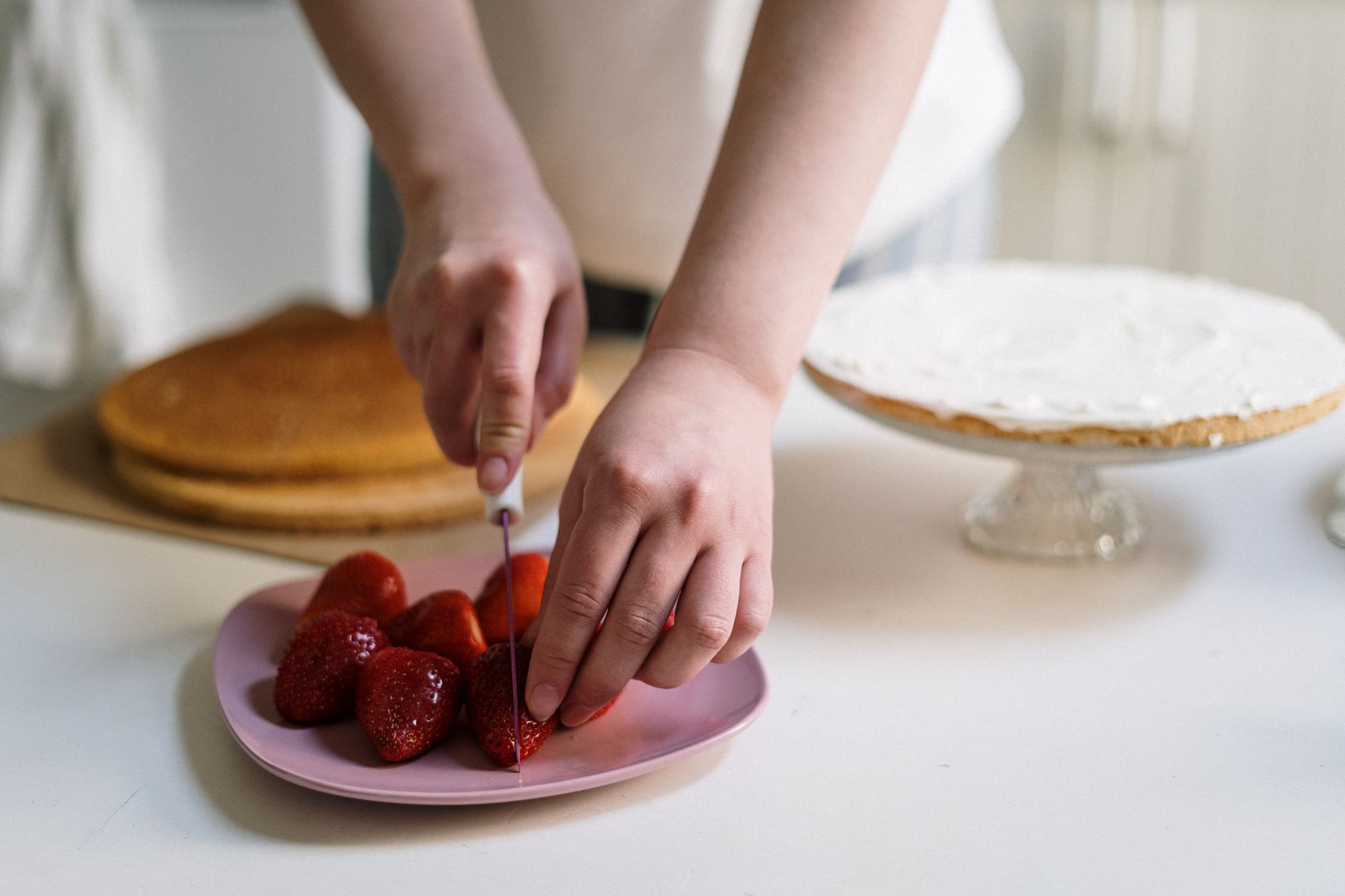 Fresh strawberry corn cakes topped with whipped cream