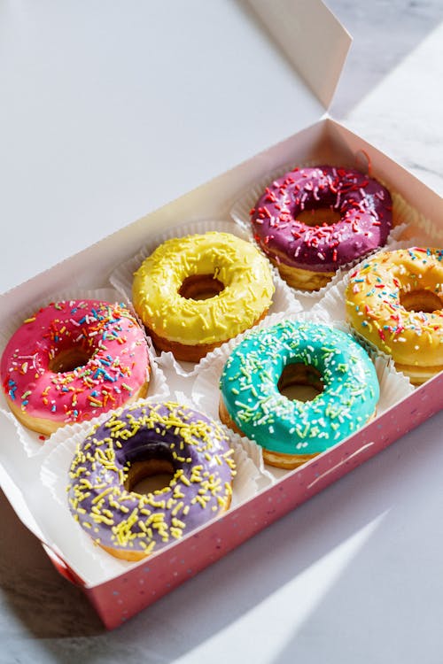 Free White and Pink Doughnut on White Box Stock Photo