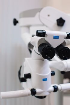 Detailed image of a professional optical microscope used in medical research.