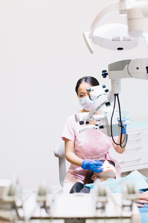 Dentist with a Patient on Check-Up