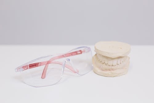 Eyeglasses and Artificial Teeth