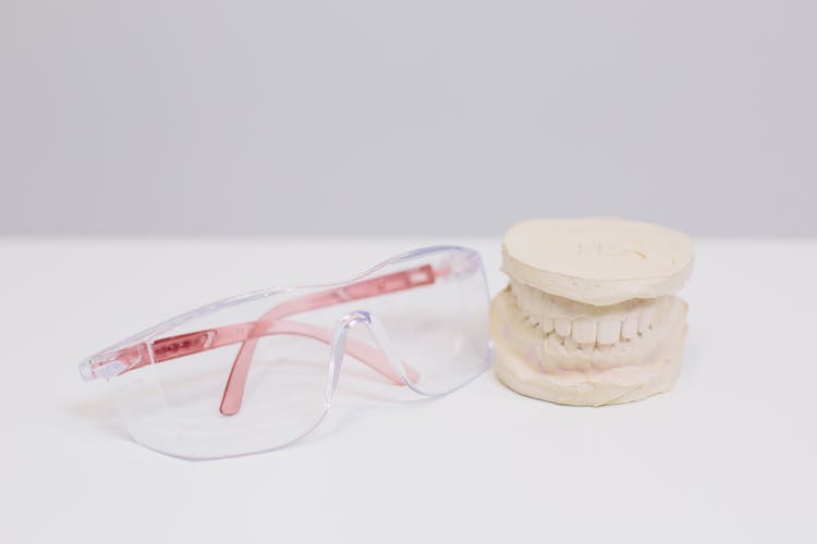 Eyeglasses And Artificial Teeth