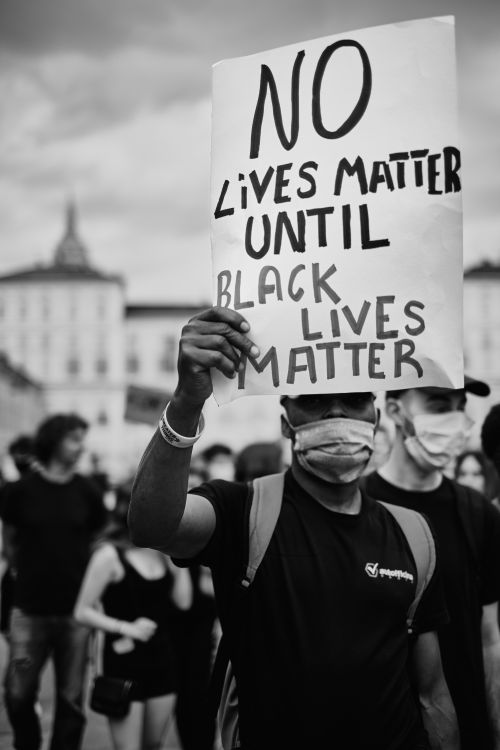 Free Black Lives Matter protest with masks and placards in Torino, Italy. Stock Photo
