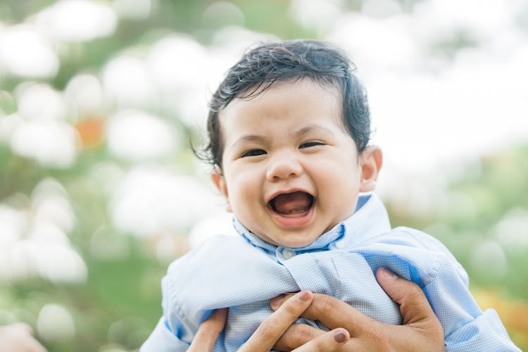 Baby In A Blue Shirt