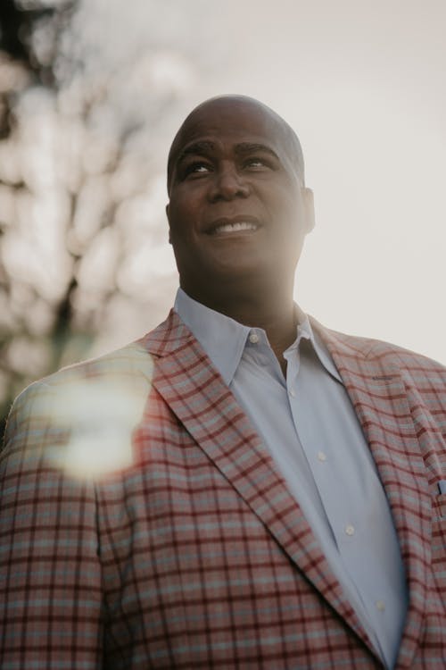 Man in Red and White Plaid Button Up Shirt