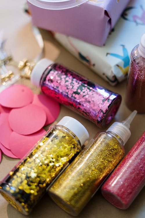 Pink and Yellow Nail Polish Bottles