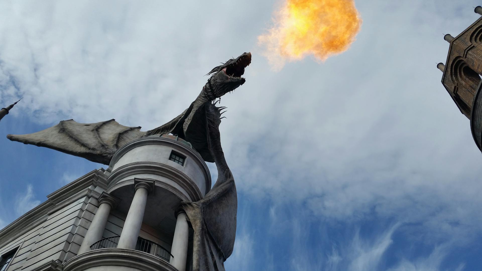 Monument of Dragon on a Roof Throwing Fire