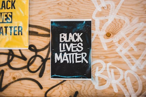 Free Sign Black Lives Matter on sheet on wall Stock Photo