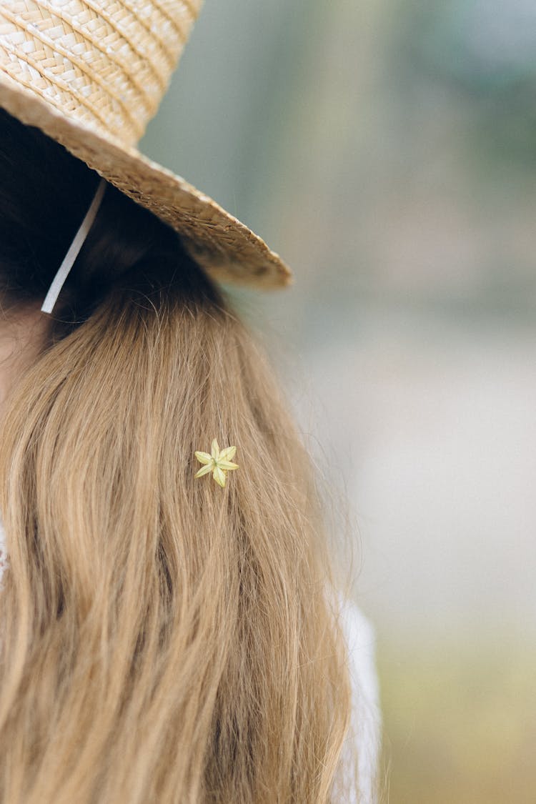 Flower On Woman's Hair