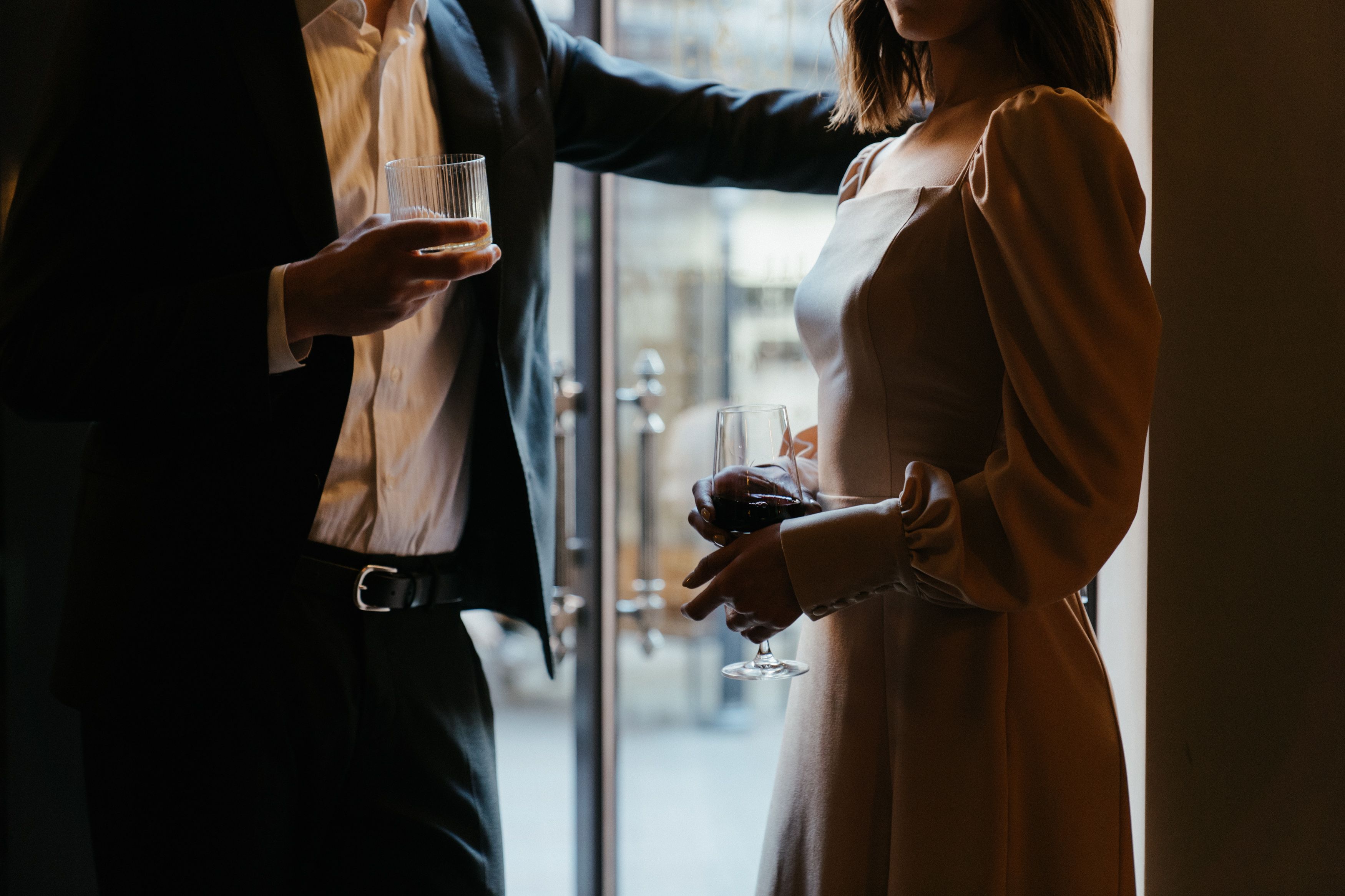 Woman in White Dress Kissing Man in Gray Suit Jacket · Free Stock Photo