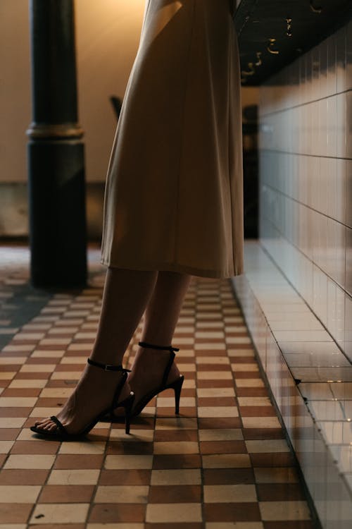 Woman in Brown Dress Wearing Black Leather Peep Toe Heeled Sandals