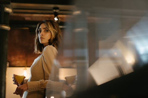 Woman in White Long Sleeve Shirt