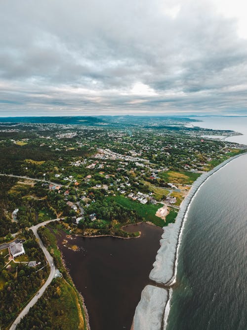 Photos gratuites de baie, bord de mer, ciel nuageux