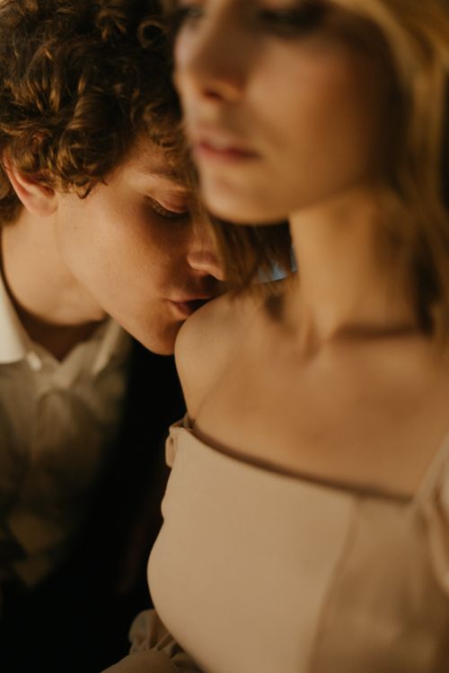 Woman in White Dress Kissing Man in Gray Suit Jacket · Free Stock Photo