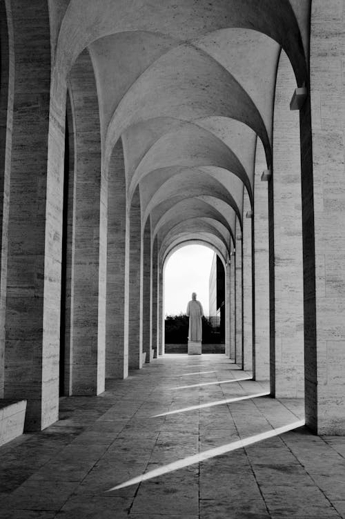 Grayscale Photo of an Empty Arcade