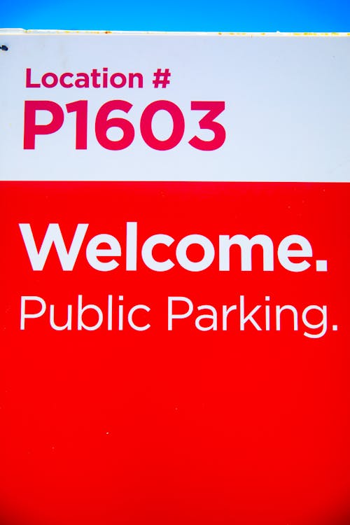 Free Red and White Parking Billboard Stock Photo