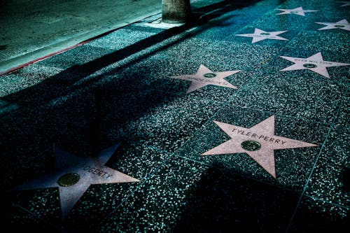  Stars on Gray and Black Tiled Sidewalk