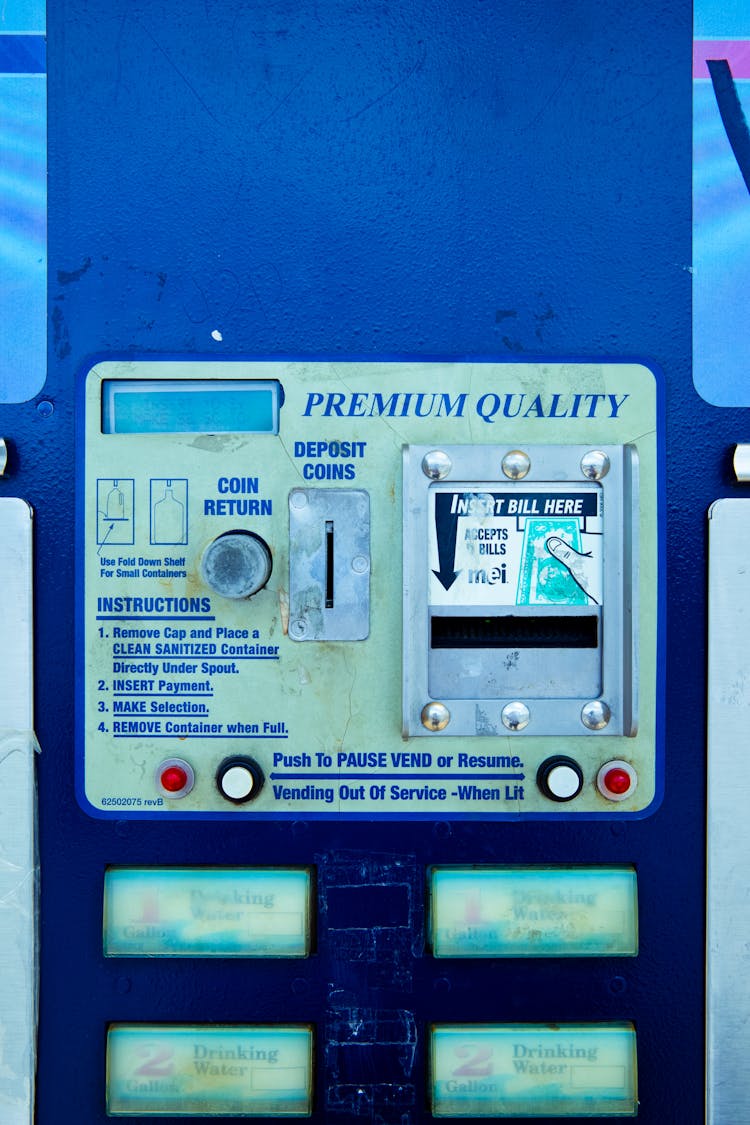 Close-up Of A Coin And Bill Insert On A Vending Machine