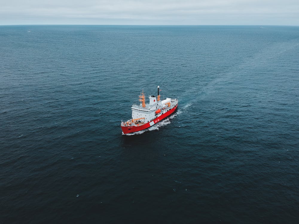 Photo of Boat Sailing on Sea