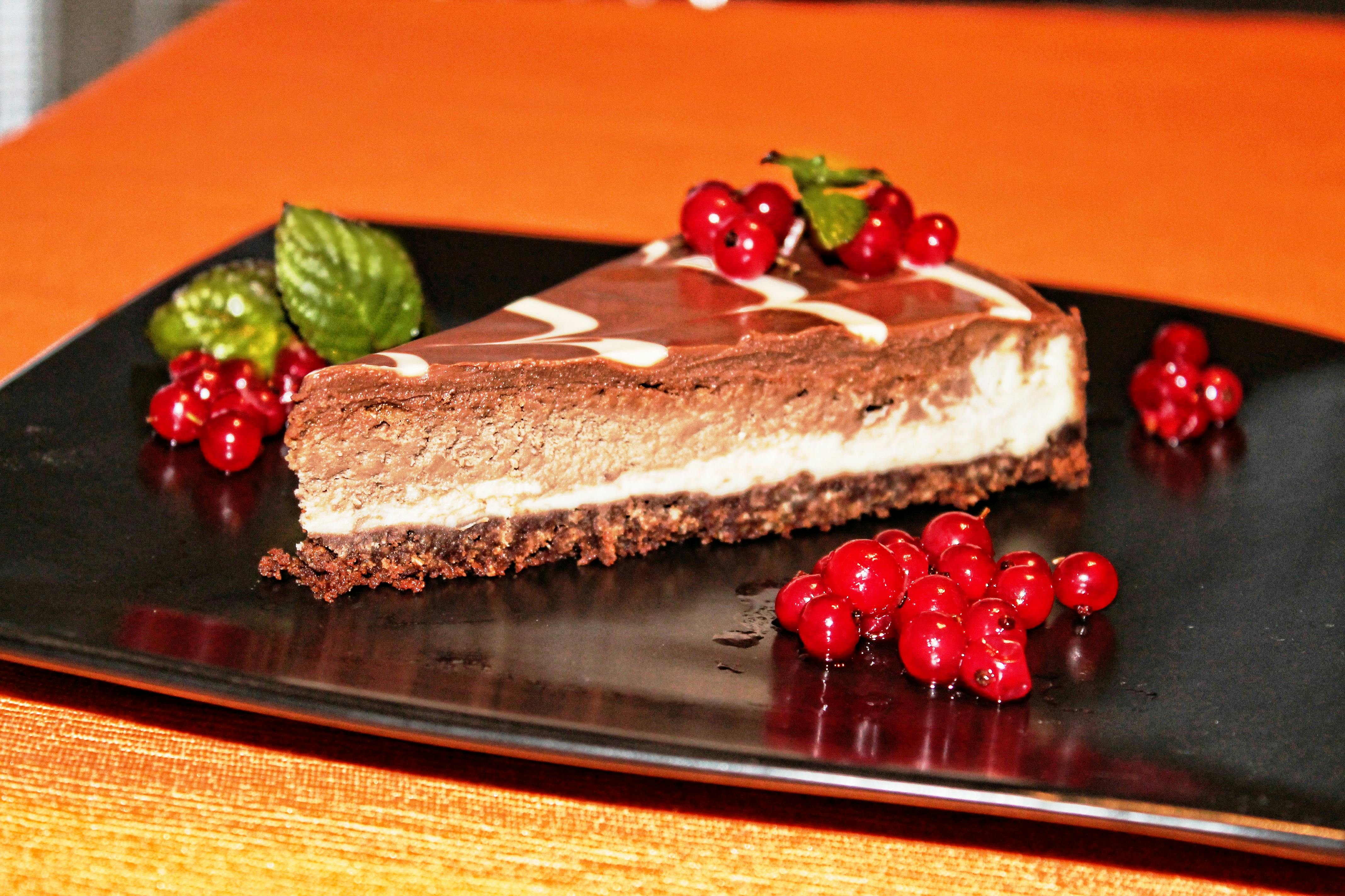 rasp berry cake on black plate