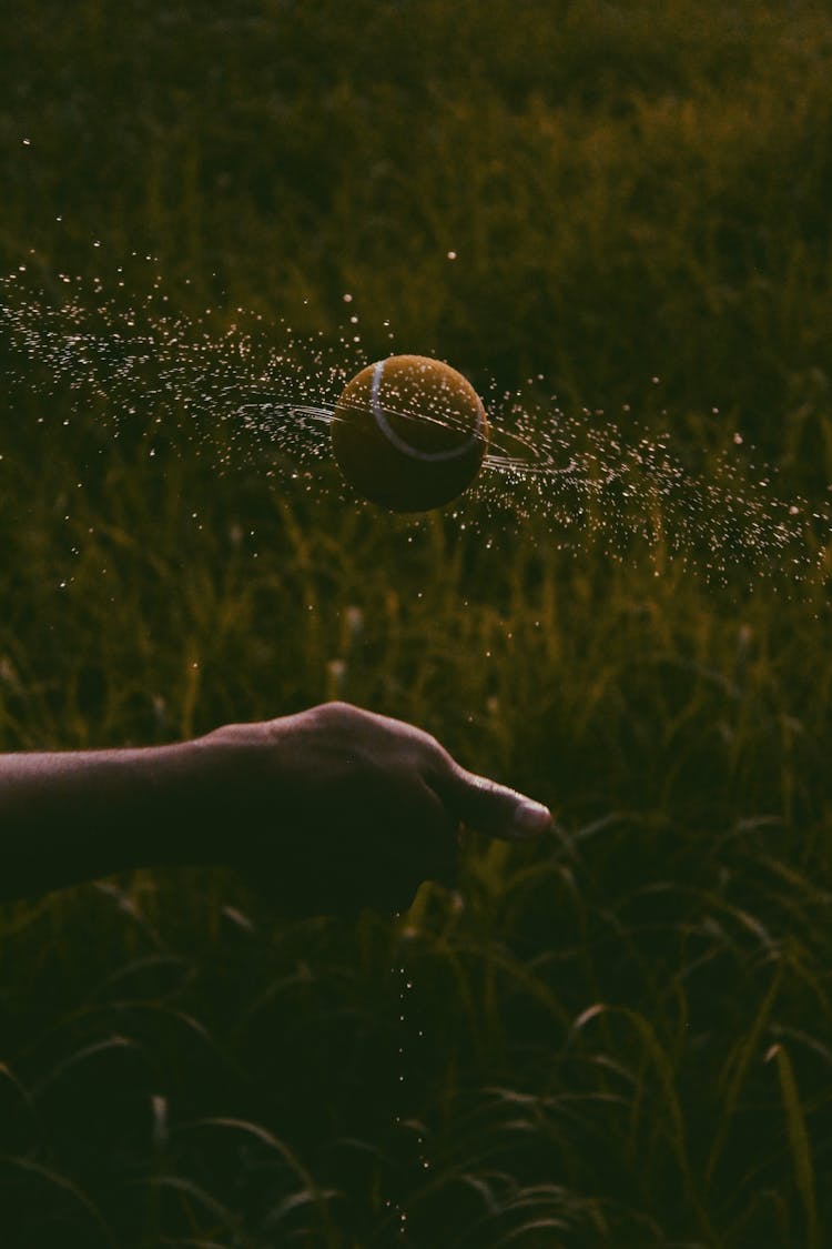 A Spinning Wet Tennis Ball