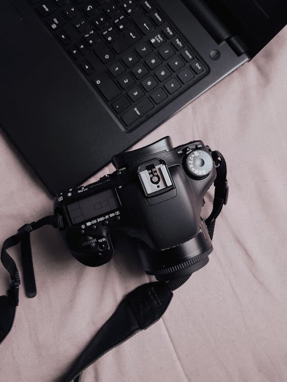 Black Dslr Camera Near Black Laptop Computer · Free Stock Photo