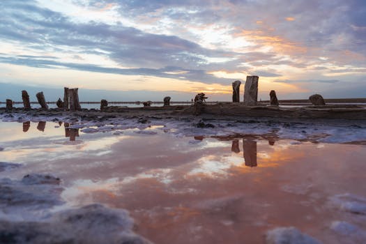 Dramatic sunset reflection over a salt lake in Kherson Oblast, Ukraine. Serene and picturesque.